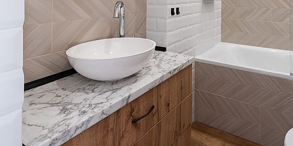Finished marble-look bathroom vanity top with undermount sink in Calgary