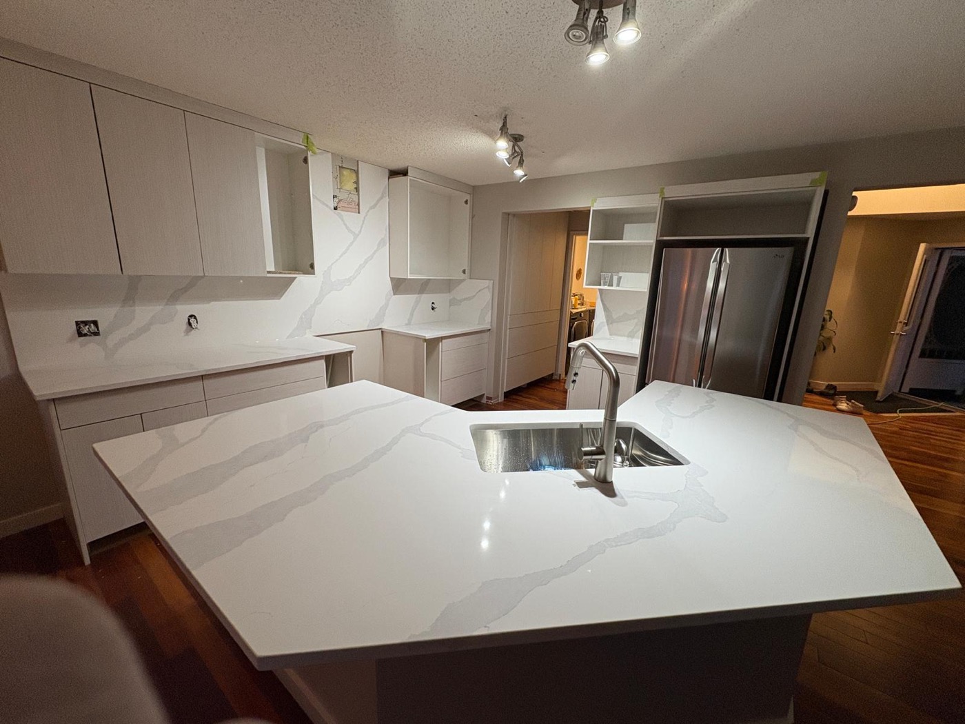 White quartz island kitchen, Calgary